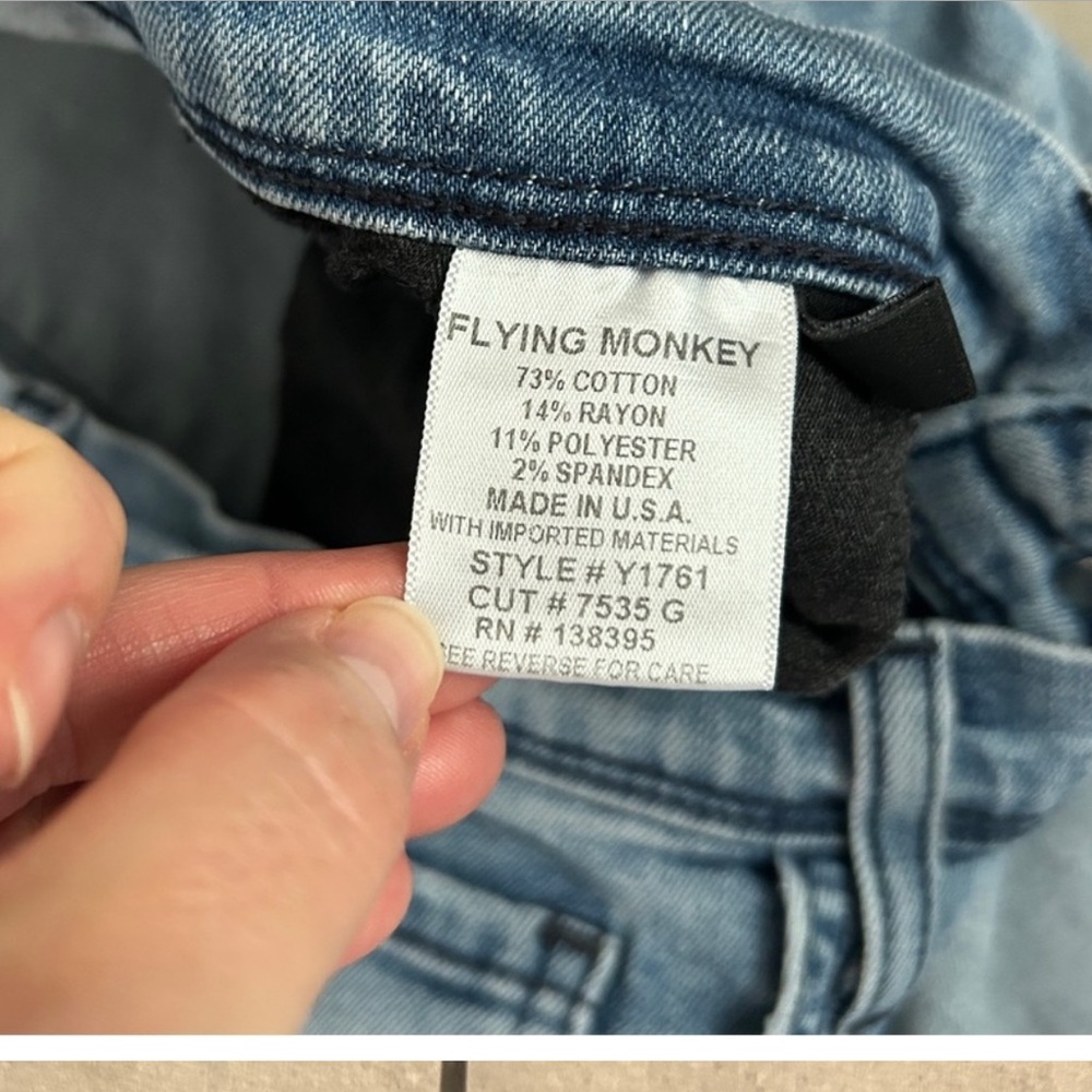 Flying monkey blue distressed straight leg raw hem jeans 27